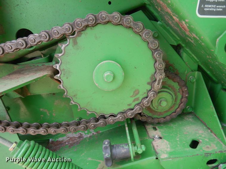 image for item DJ3019 2013 John Deere 569 Mega Wide Plus round baler