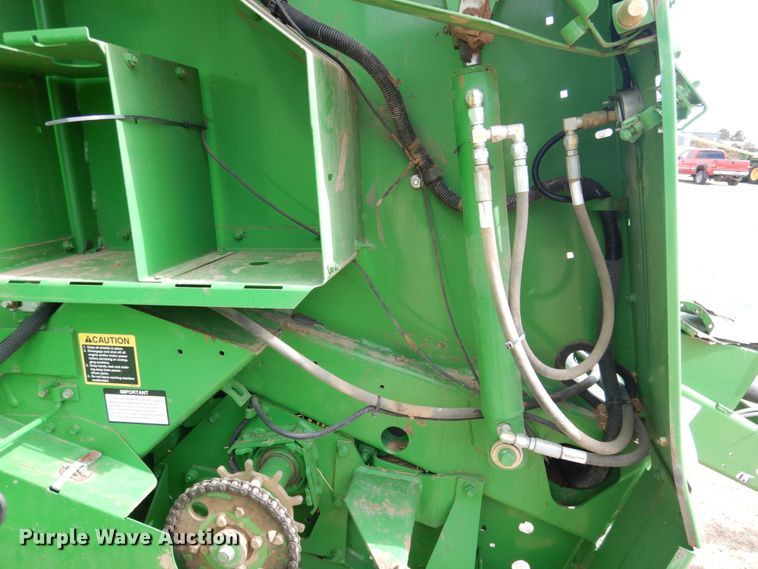 image for item DJ3019 2013 John Deere 569 Mega Wide Plus round baler
