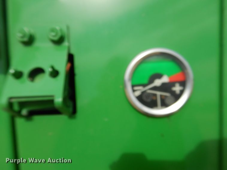 image for item DJ3019 2013 John Deere 569 Mega Wide Plus round baler