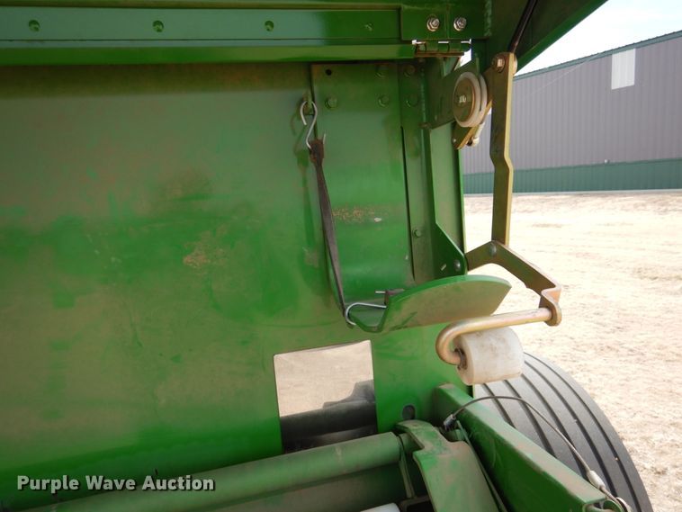 image for item DJ3019 2013 John Deere 569 Mega Wide Plus round baler