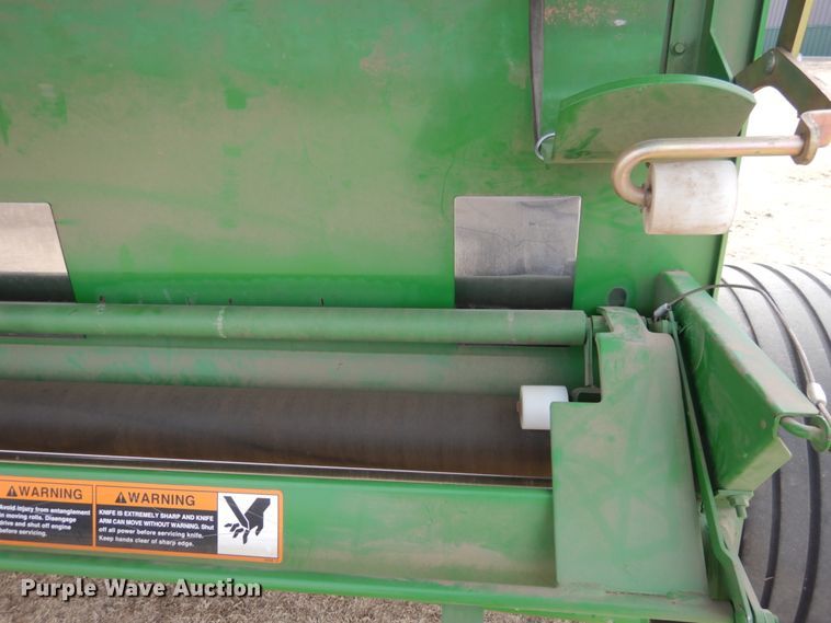 image for item DJ3019 2013 John Deere 569 Mega Wide Plus round baler