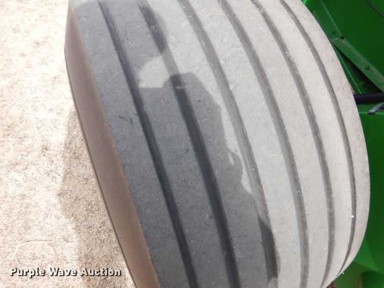 image for item DJ3019 2013 John Deere 569 Mega Wide Plus round baler