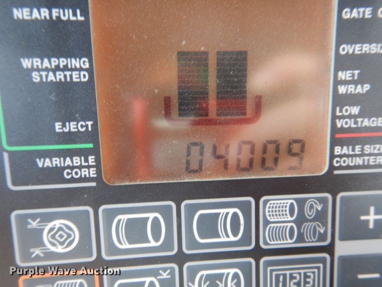 image for item DJ3019 2013 John Deere 569 Mega Wide Plus round baler