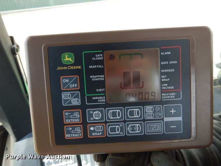 image for item DJ3019 2013 John Deere 569 Mega Wide Plus round baler