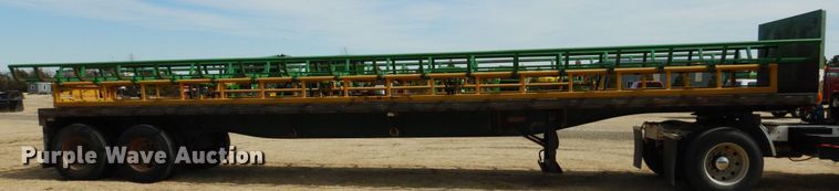 image for item DJ3072 1988 Fruehauf FB8 bale carrier flatbed trailer