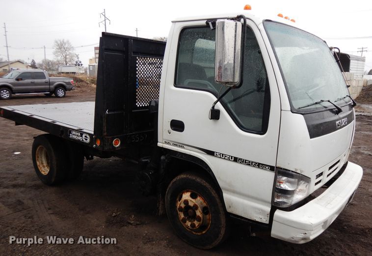 image for item DF6661 2007 Isuzu NPR flatbed truck