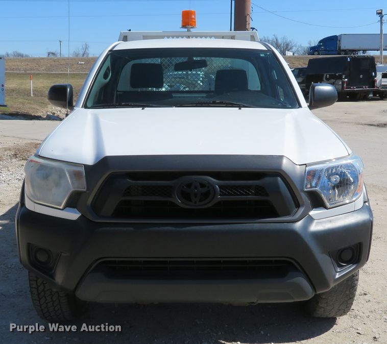 image for item DI2095 2014 Toyota Tacoma  flatbed pickup truck