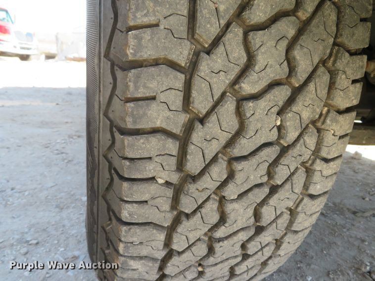 image for item DI2095 2014 Toyota Tacoma  flatbed pickup truck