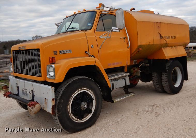 image for item DJ3003 1984 GMC Brigadier water truck