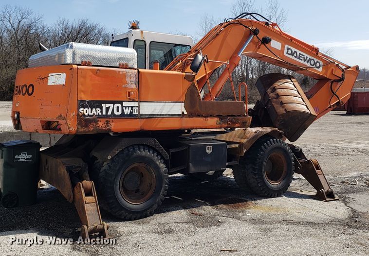 image for item GO9294 1999 Daewoo Solar 170W-III rubber tired excavator