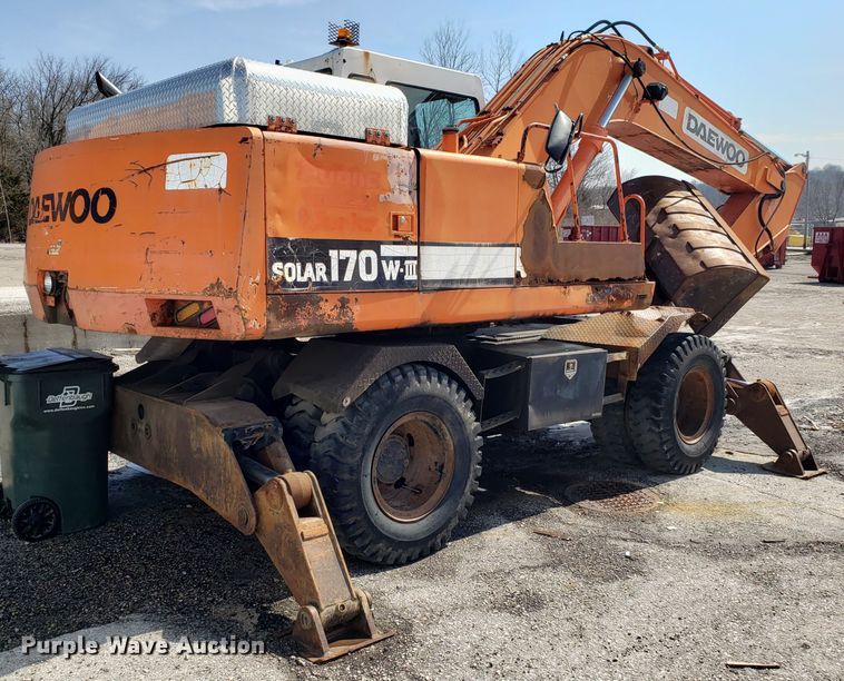 image for item GO9294 1999 Daewoo Solar 170W-III rubber tired excavator