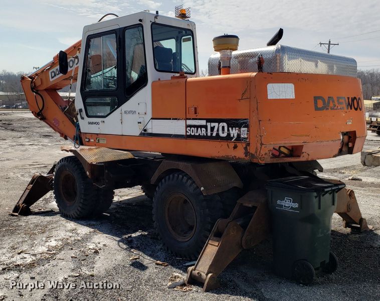image for item GO9294 1999 Daewoo Solar 170W-III rubber tired excavator