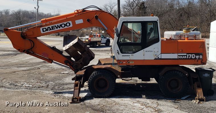 image for item GO9294 1999 Daewoo Solar 170W-III rubber tired excavator
