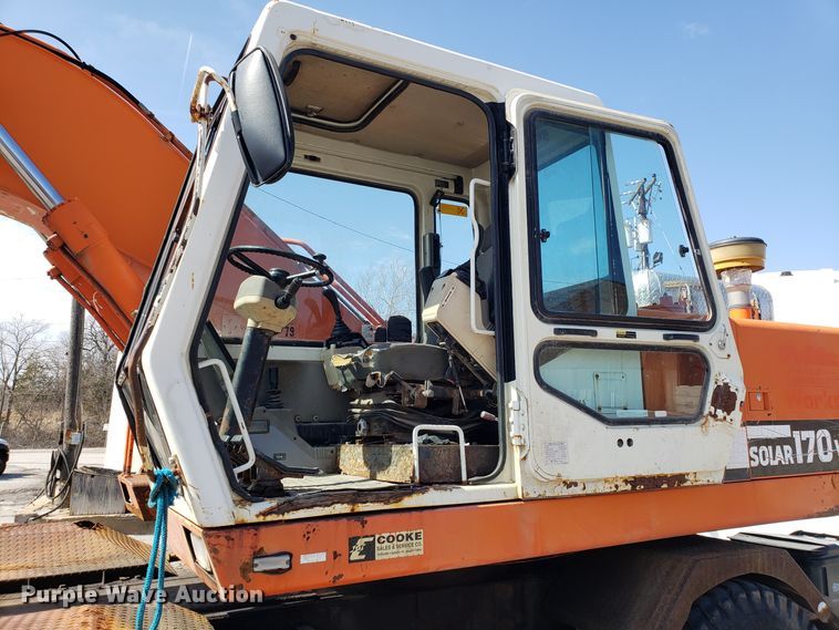 image for item GO9294 1999 Daewoo Solar 170W-III rubber tired excavator