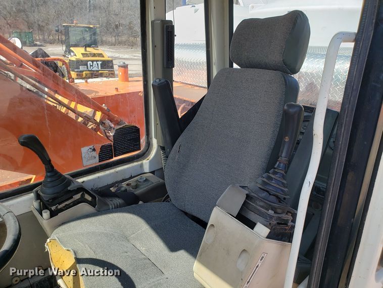 image for item GO9294 1999 Daewoo Solar 170W-III rubber tired excavator