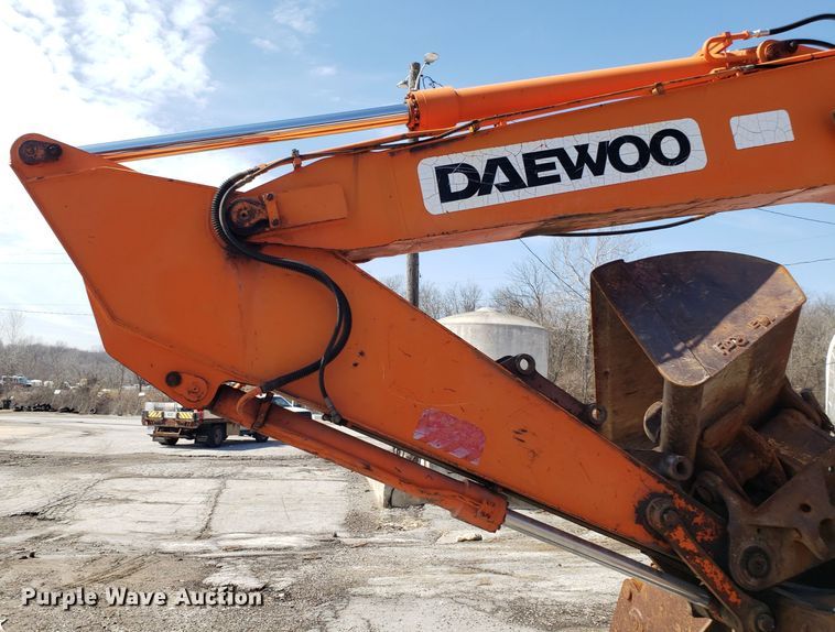 image for item GO9294 1999 Daewoo Solar 170W-III rubber tired excavator