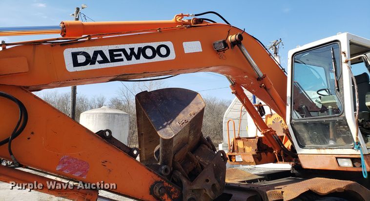 image for item GO9294 1999 Daewoo Solar 170W-III rubber tired excavator