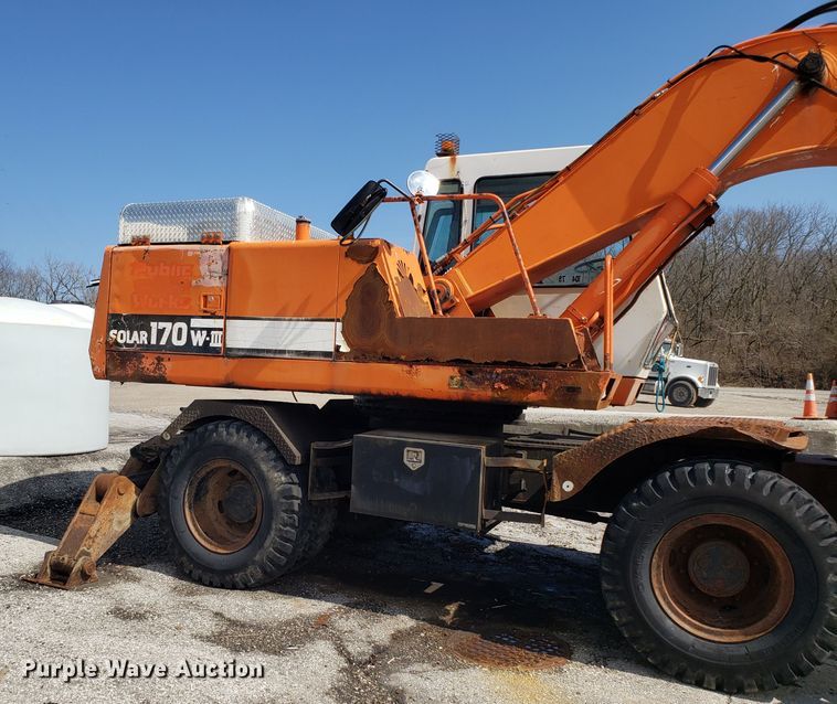 image for item GO9294 1999 Daewoo Solar 170W-III rubber tired excavator