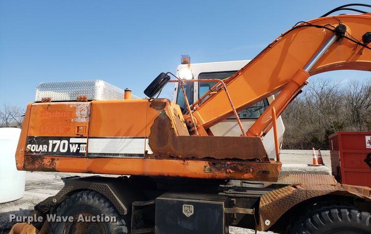 image for item GO9294 1999 Daewoo Solar 170W-III rubber tired excavator