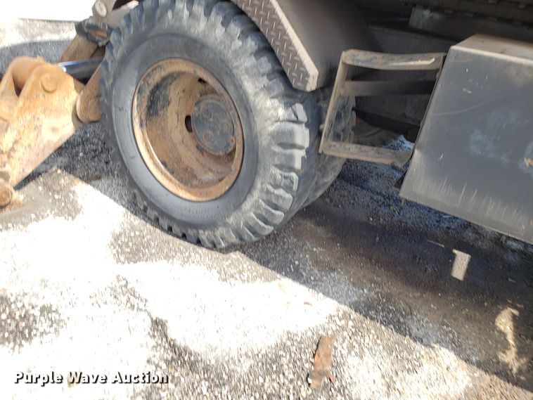 image for item GO9294 1999 Daewoo Solar 170W-III rubber tired excavator