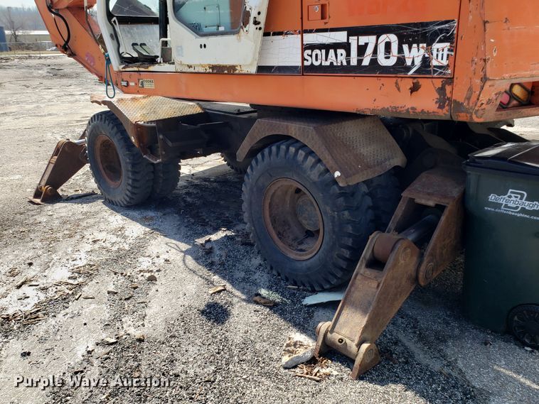 image for item GO9294 1999 Daewoo Solar 170W-III rubber tired excavator