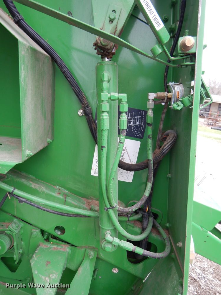 image for item DH4446 2010 John Deere 468 Mega Wide Plus round baler