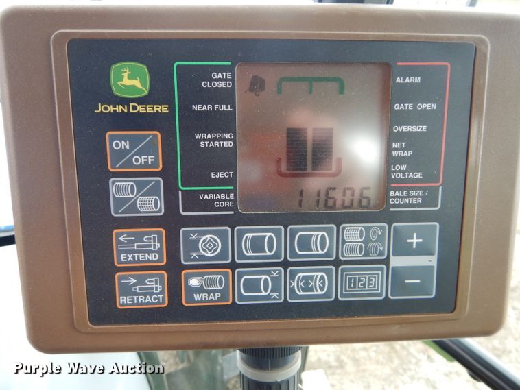 image for item DH4446 2010 John Deere 468 Mega Wide Plus round baler