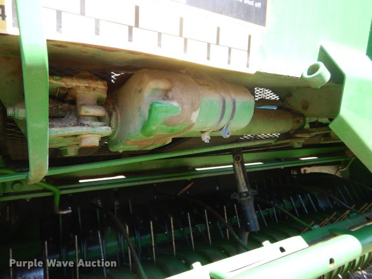 image for item DH6472 2004 John Deere 557 Mega Wide round baler