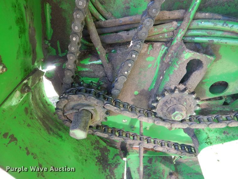 image for item DH6472 2004 John Deere 557 Mega Wide round baler