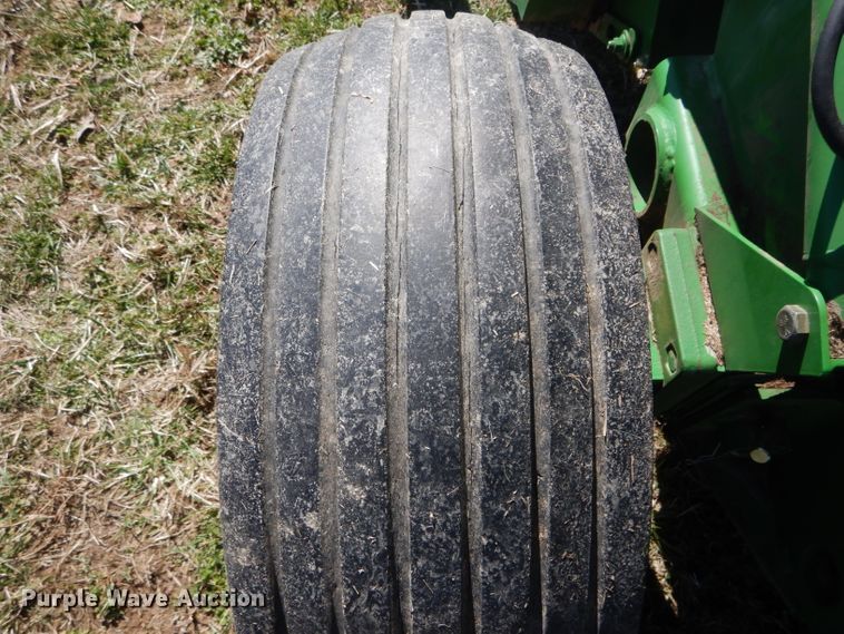 image for item DH6472 2004 John Deere 557 Mega Wide round baler