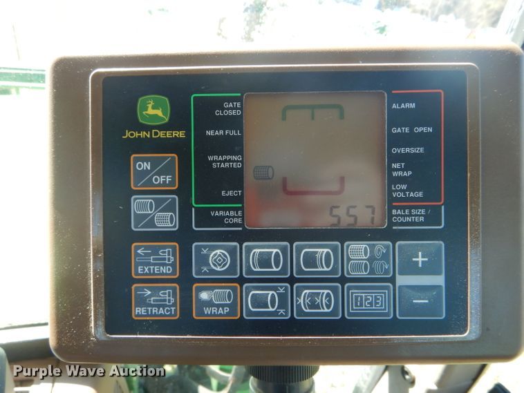image for item DH6472 2004 John Deere 557 Mega Wide round baler