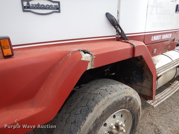 image for item GW9708 2000 Volvo Autocar roll-off container truck