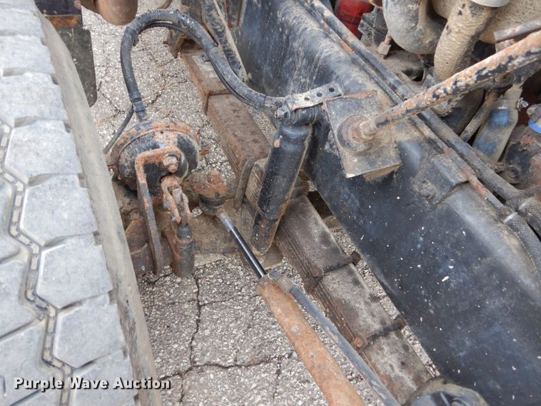 image for item GW9708 2000 Volvo Autocar roll-off container truck