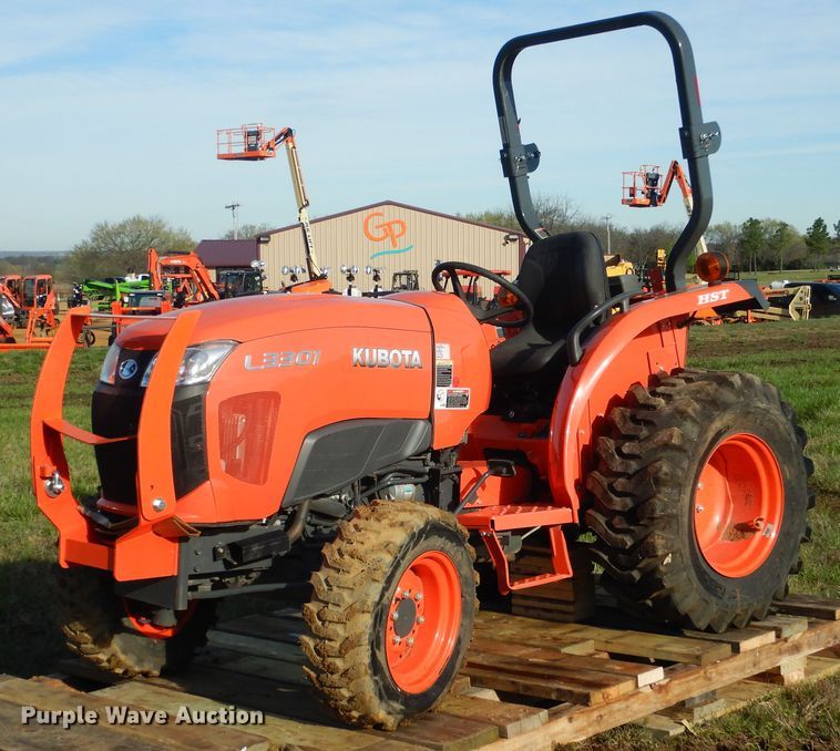 image for item ES9539 2016 Kubota L3301D MFWD tractor