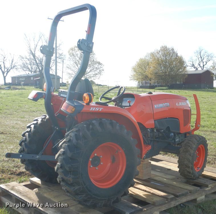 image for item ES9539 2016 Kubota L3301D MFWD tractor