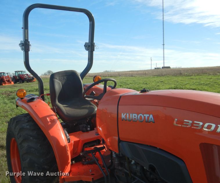 image for item ES9539 2016 Kubota L3301D MFWD tractor