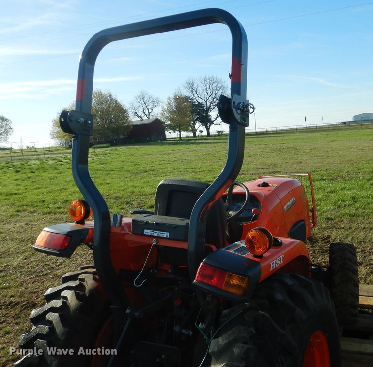 image for item ES9539 2016 Kubota L3301D MFWD tractor