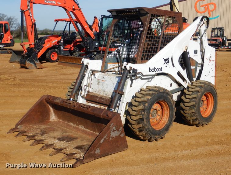 image for item ES9555 1999 Bobcat 873  skid steer loader