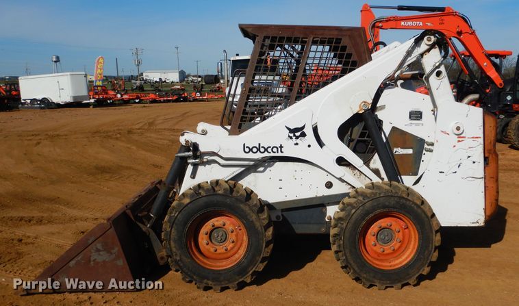 image for item ES9555 1999 Bobcat 873  skid steer loader