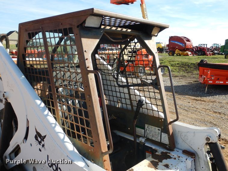 image for item ES9555 1999 Bobcat 873  skid steer loader