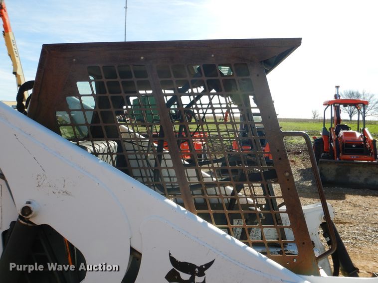 image for item ES9555 1999 Bobcat 873  skid steer loader