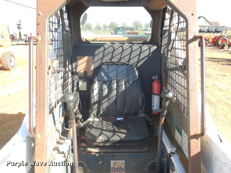 image for item ES9555 1999 Bobcat 873  skid steer loader