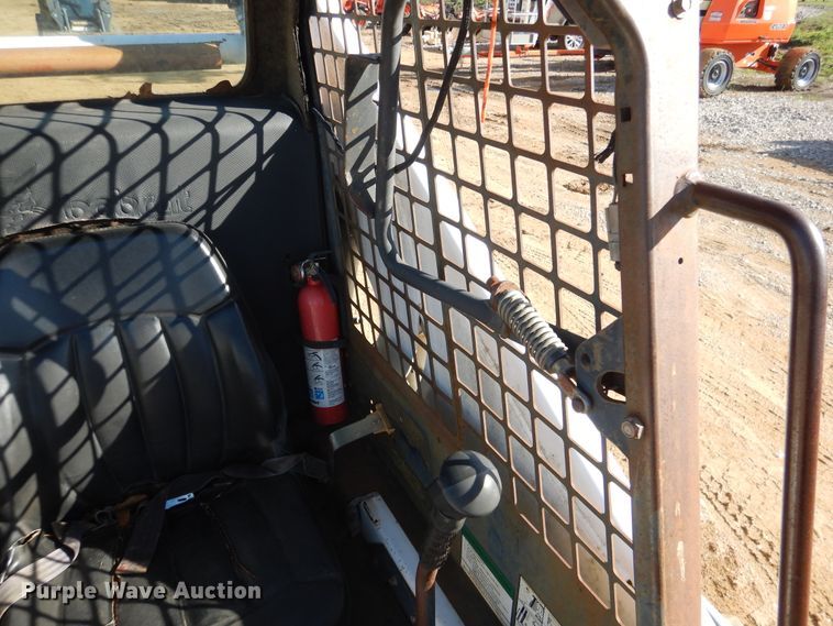 image for item ES9555 1999 Bobcat 873  skid steer loader