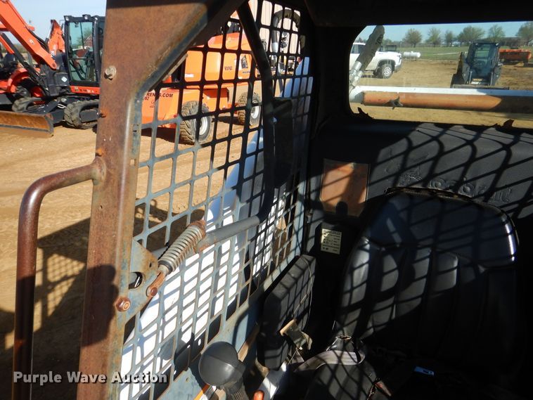 image for item ES9555 1999 Bobcat 873  skid steer loader