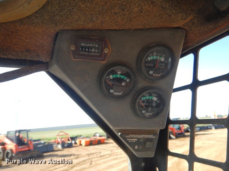 image for item ES9555 1999 Bobcat 873  skid steer loader