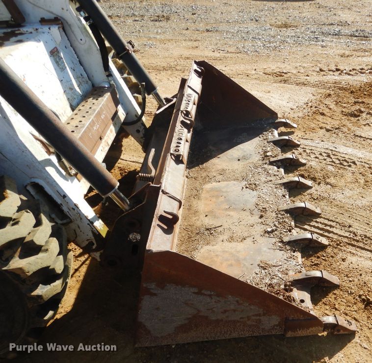 image for item ES9555 1999 Bobcat 873  skid steer loader