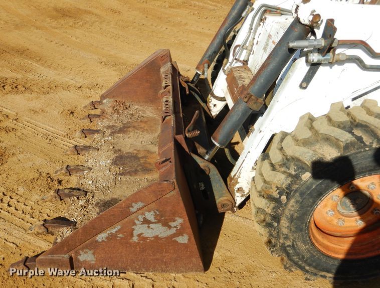 image for item ES9555 1999 Bobcat 873  skid steer loader