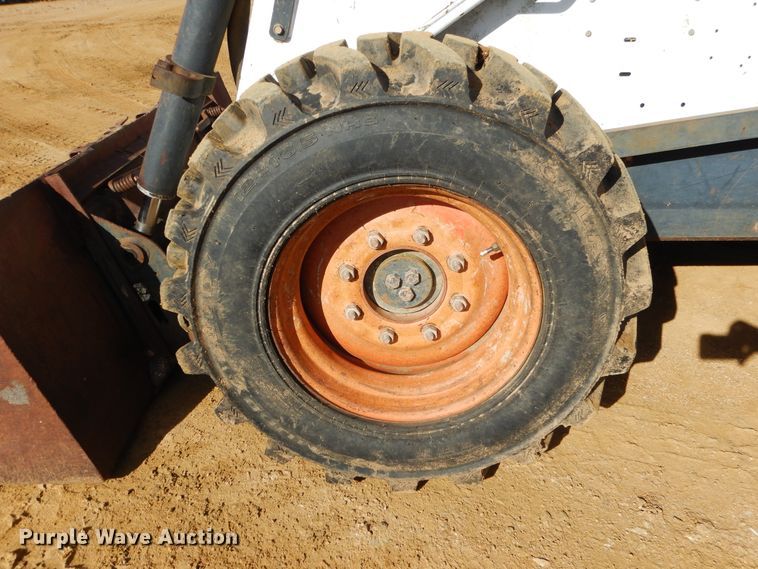 image for item ES9555 1999 Bobcat 873  skid steer loader