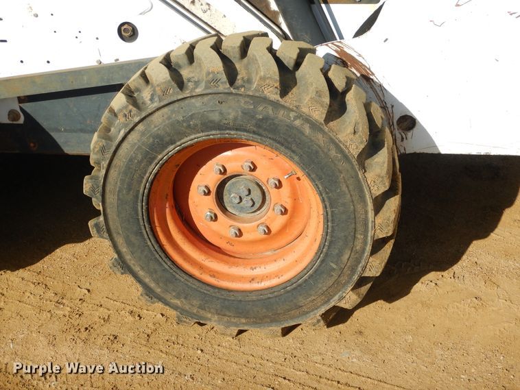 image for item ES9555 1999 Bobcat 873  skid steer loader