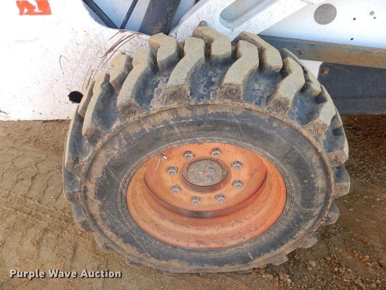 image for item ES9555 1999 Bobcat 873  skid steer loader